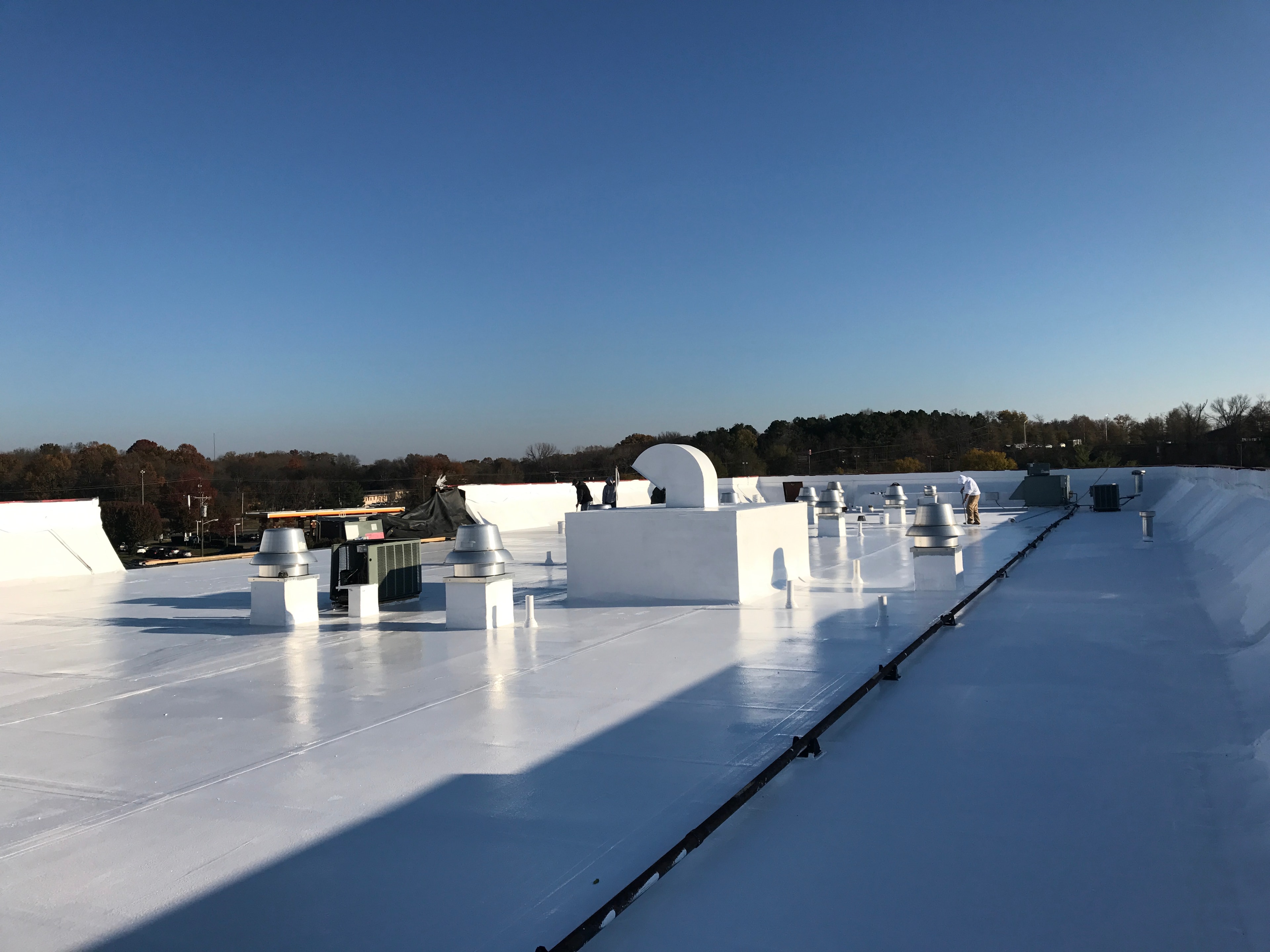 Hotel flat roof silicone coating project in Nashville TN by 4 Square Roofing